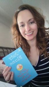 Mandy holds copy of Judy Blume book