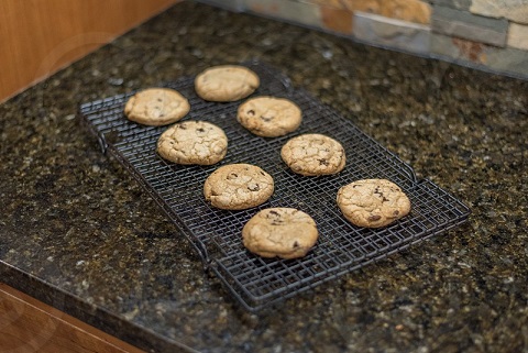Freshly baked cookies sitting on kitchen tabletop