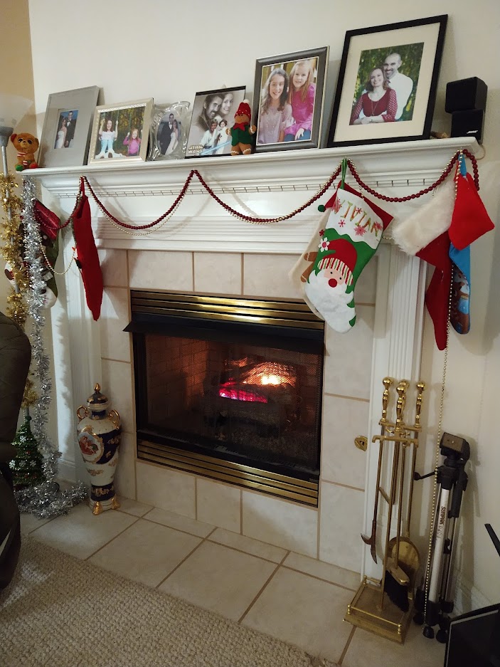 fireplace inside a home with fire going